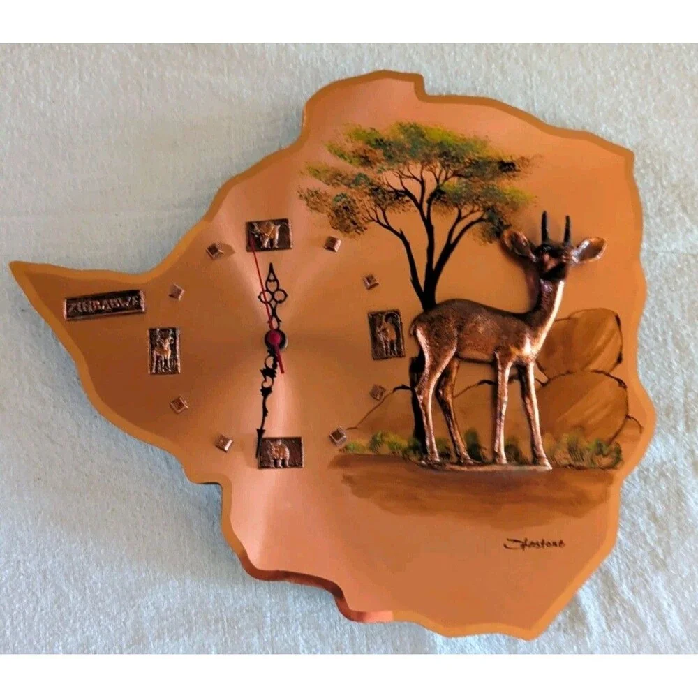 Gastone Zimbabwe Copper Brass Colored Wall Clock - Battery Powered